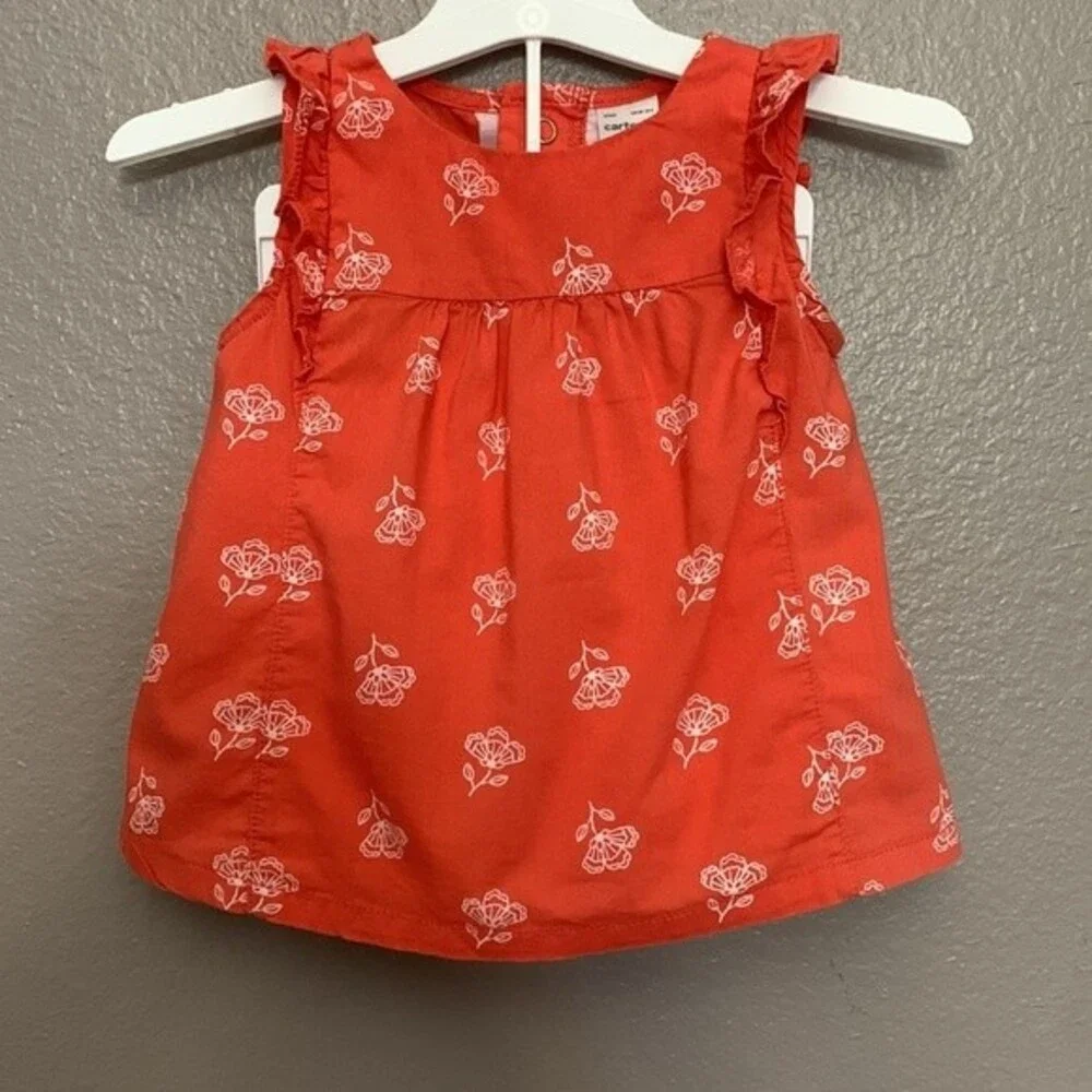 Carter's 12 month baby girl set of top and shorts.